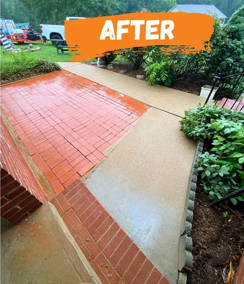 After: the brick red and the path clean.