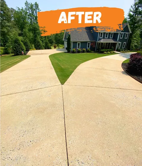 After: the same driveway, evenly light.