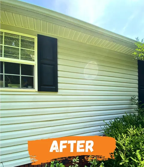 After: the siding clean and even.