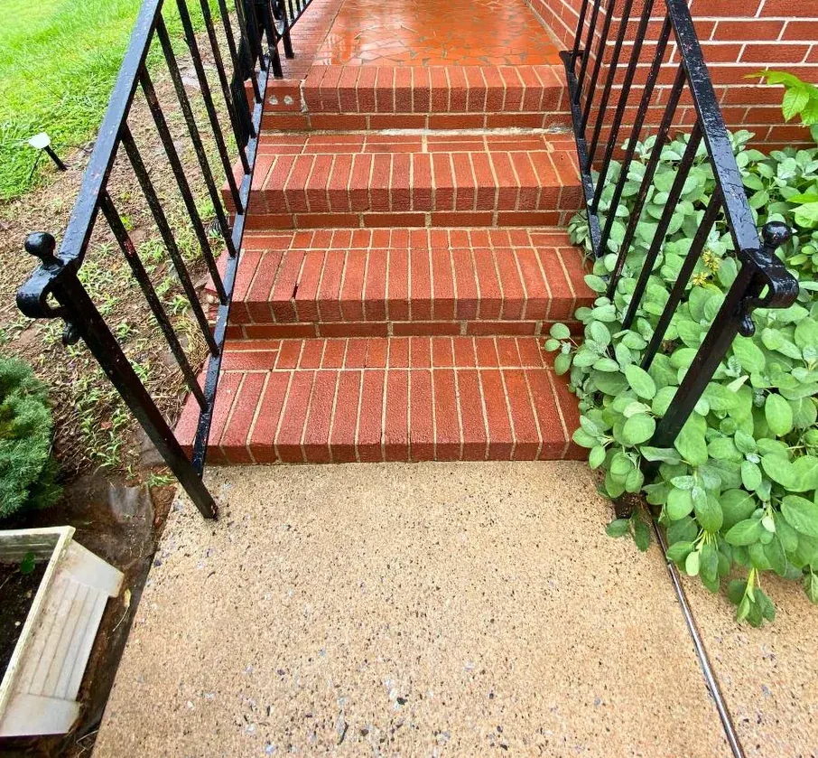 After: the same steps, the brick a brighter red and the walk light and even.